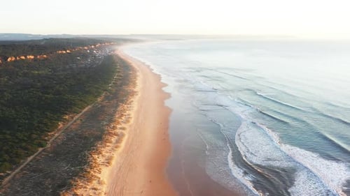 Sandy Beach Stretching Along the Coastline Aerial View