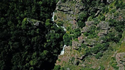 water flowing from a waterfall