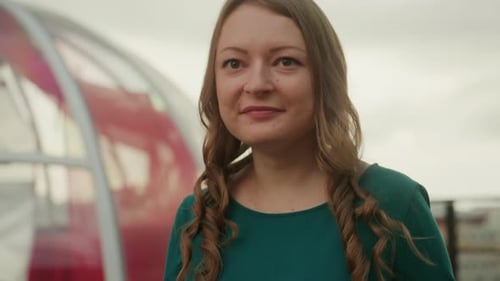 Woman Enjoys Rooftop Moment Woman in Green Sweater Prepares Romantic Celebration Outdoors Relaxed