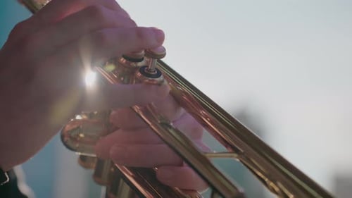 Trumpet Close Up as Fingers Play Instrument
