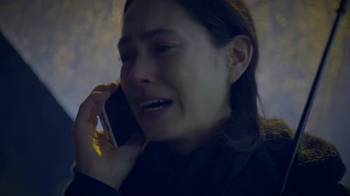 Distraught Woman Crying During Emotional Phone Call