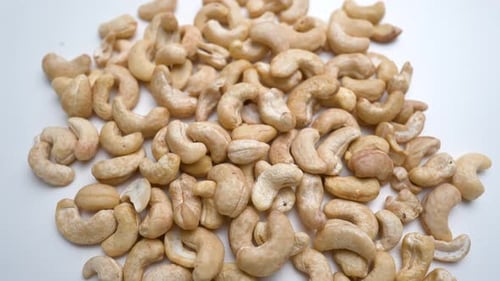 Fresh Cashew Nuts Rotating Moving View In White Background