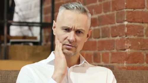 Toothache Middle Age Man with Pain in Teeth