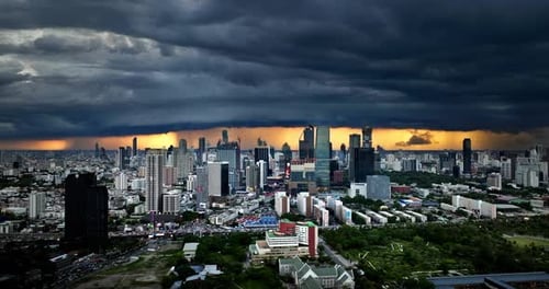 Incredible and spectacular cityscape of Bangkok town with dramatic stormy cumulus clouds, Thailand.