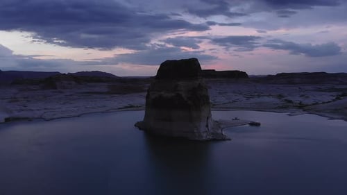 Magnificent rock formation in Utah waters during colorful sunset (drone shot)