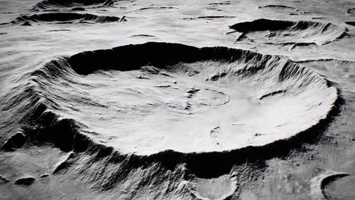 Craters On The Moon's Surface With Advancing Shadows