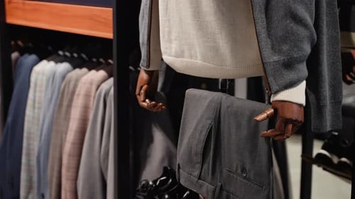 Mannequins with Men's Clothing in the Boutique Clothing Store
