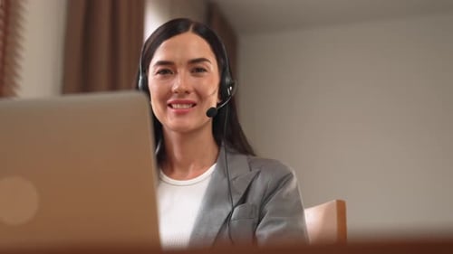 Female call center operator or customer service helpdesk staff. Blithe