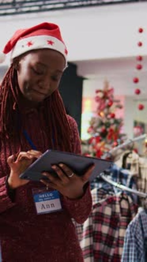 Vertical Video Supervisor Inputting Prices on Tablet