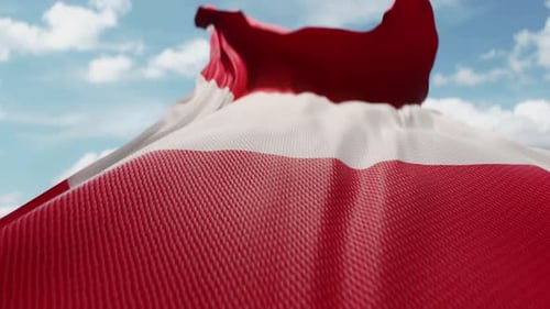 Realistic Red and White Flag Waving in the Sky