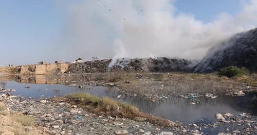 Burning Trash Dump in Rural Environment