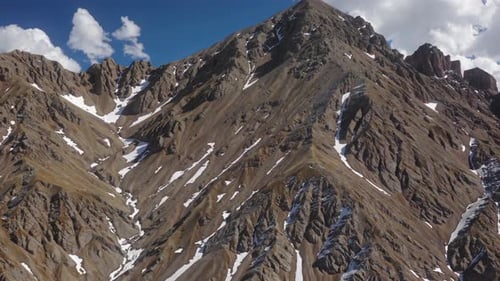 Majestic Mountain Peaks Standing Tall with Snow and Rock Formations That Dazzle the Eye