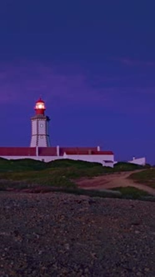 Lighthouse Sending Its Light Beam at Night Cape Espichel Portugal