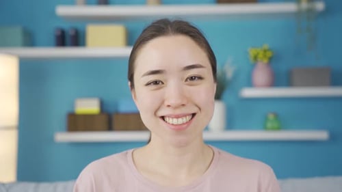 Close-up happy and cheerful Asian young woman.