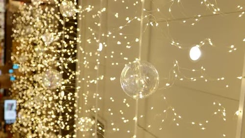 Vertical warm Christmas shopping mall decorations lights, interior, close up