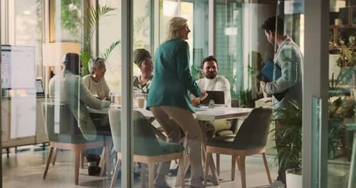 Business people, shaking hands and welcome with ceo in meeting, partnership agreement or greeting