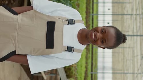 Woman Smiling in Greenhouse, Agriculture Workplace