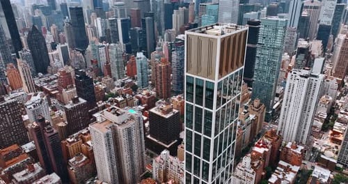Sutton Tower building in the architecture of New York. Top view on the luxurious skyscraper
