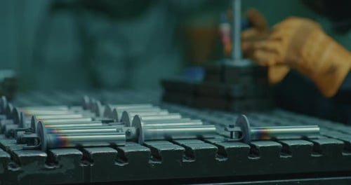 Silhouette Professional Men in Welding Masks and Gloves Work in the Workshop with Arc Welding and