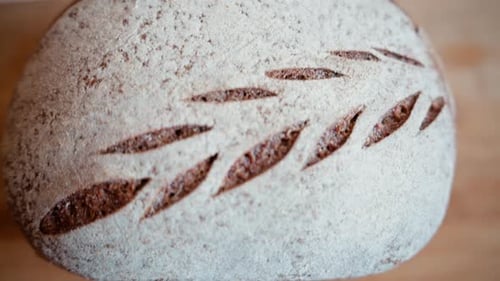 Artisanal Sourdough Bread Close-Up with Leaf Pattern