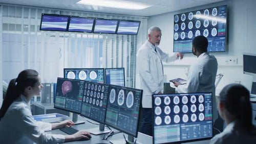 Team of Professional Scientists Work in the Brain Research Laboratory. Neurologists / Neuroscientis