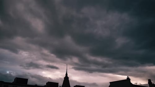 Storm Clouds Time-Lapse over City Skyline