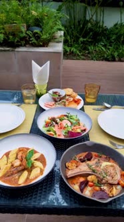 Variety of Food Dishes on a Table