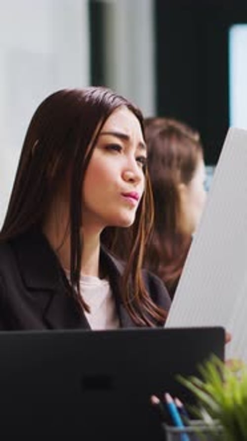 Vertical Video Portrait of Architect Studying 3d Building Model for Measurements