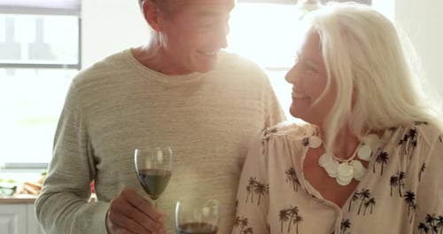 Affectionate senior couple shares a loving kiss