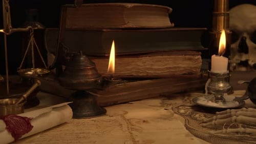 Vintage Books, Skull, and Candles on Spooky Table