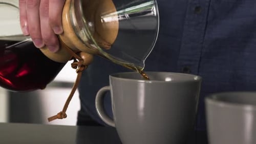 Pouring Coffee into a Mug Close Up