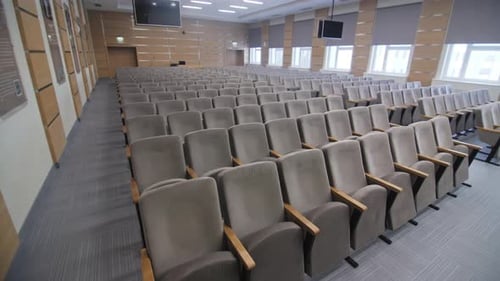 Spectator Seats Rows in Conference Hall with Wooden Decor