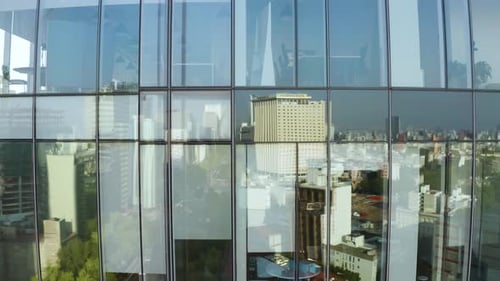 Windows in Financial District Office Skyscraper Building - Aerial Rising
