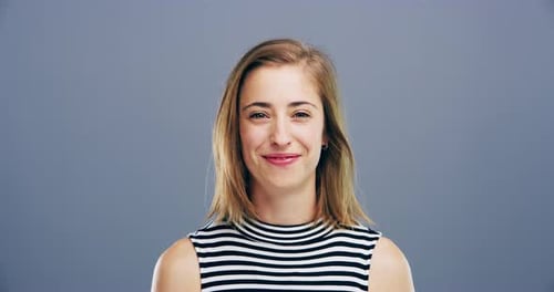 Young Woman Smiling Happily in Close Up