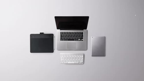 Flat Lay Top View Office Desk Working Space with Laptop and Supplies