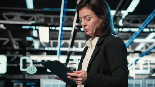 Technician Walking in Data Center Using AR Simulation to Conduct Security Audit