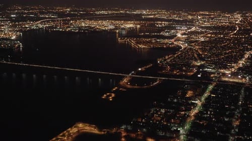 Aerial view of illuminated highway traffic road at night. cars driving freeway