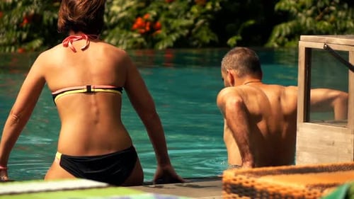 Young Couple Relaxing in Swimming Pool, Super 240