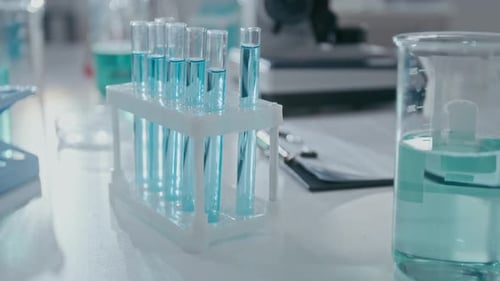 Test Tubes and Beaker in a Laboratory Setting