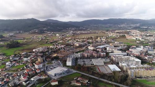 Flying Over Village with New Buildings Under Construction