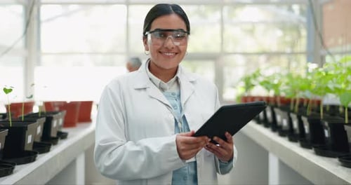Tablet, portrait and sustainability with a woman in a greenhouse to study plant growth for ecology