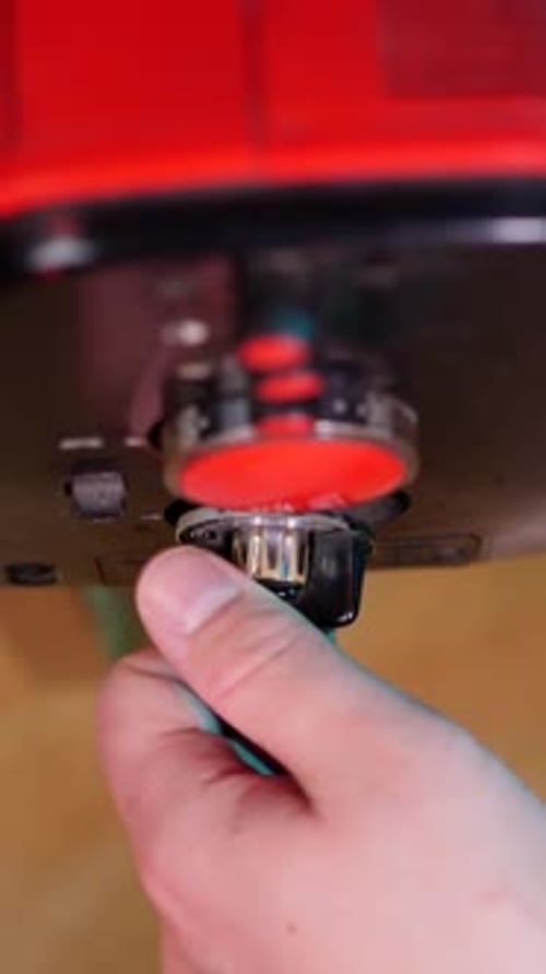 Vertical Video Close Up Hand Turning Channel Knob Dial on Old Vintage TV Tuning Old Analog TV