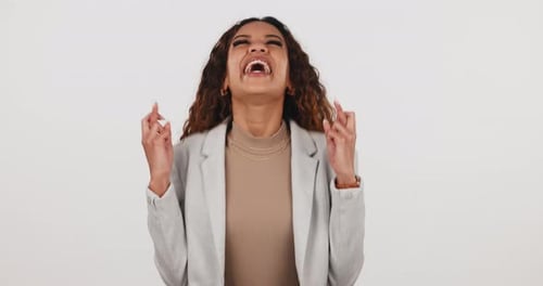 Hope, fingers crossed and woman in studio excited for lottery, feedback