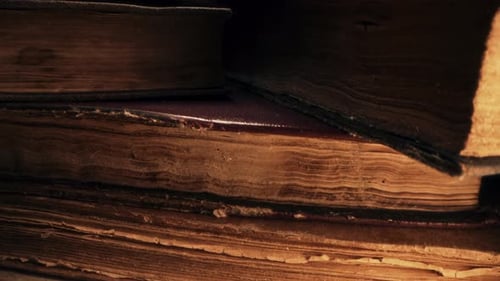 Macro View of Saved Medieval Books with Ancient Writings Religious Literature Archival Manuscripts
