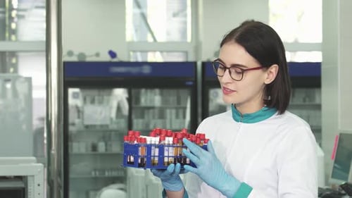 Medical Professional Discussing Tests in Lab