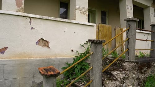 The ruins of an old house in a village.