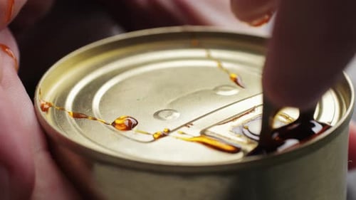 Opening Can with Pull Tab in Macro Shot