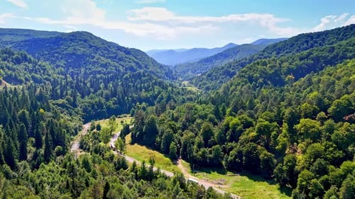 Misty clouds drifting over the mountain spine.