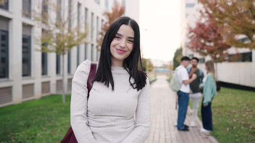 Young Female University Student Smiling on Campus