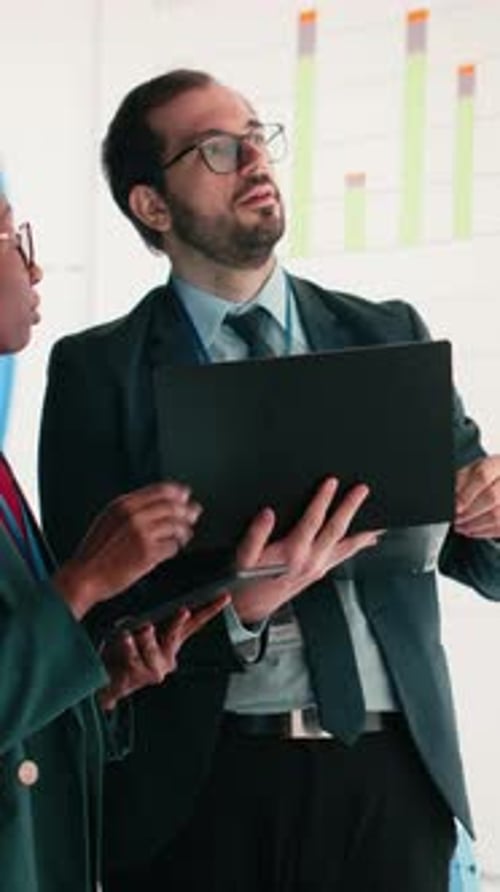 Vertical Video Collaborating Fiscal Metrics and Corporate Managers Evaluating Performance